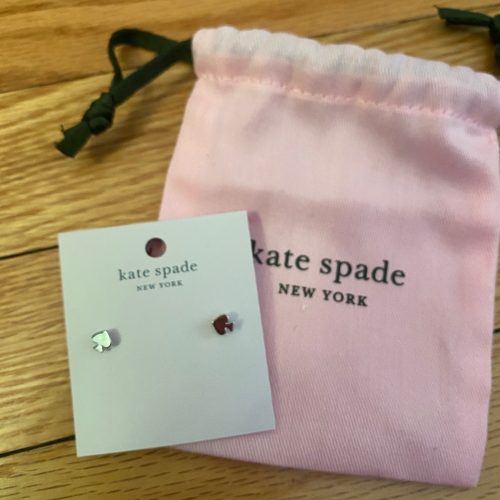 Kate spade silver spade earrings unworn, in packaging.